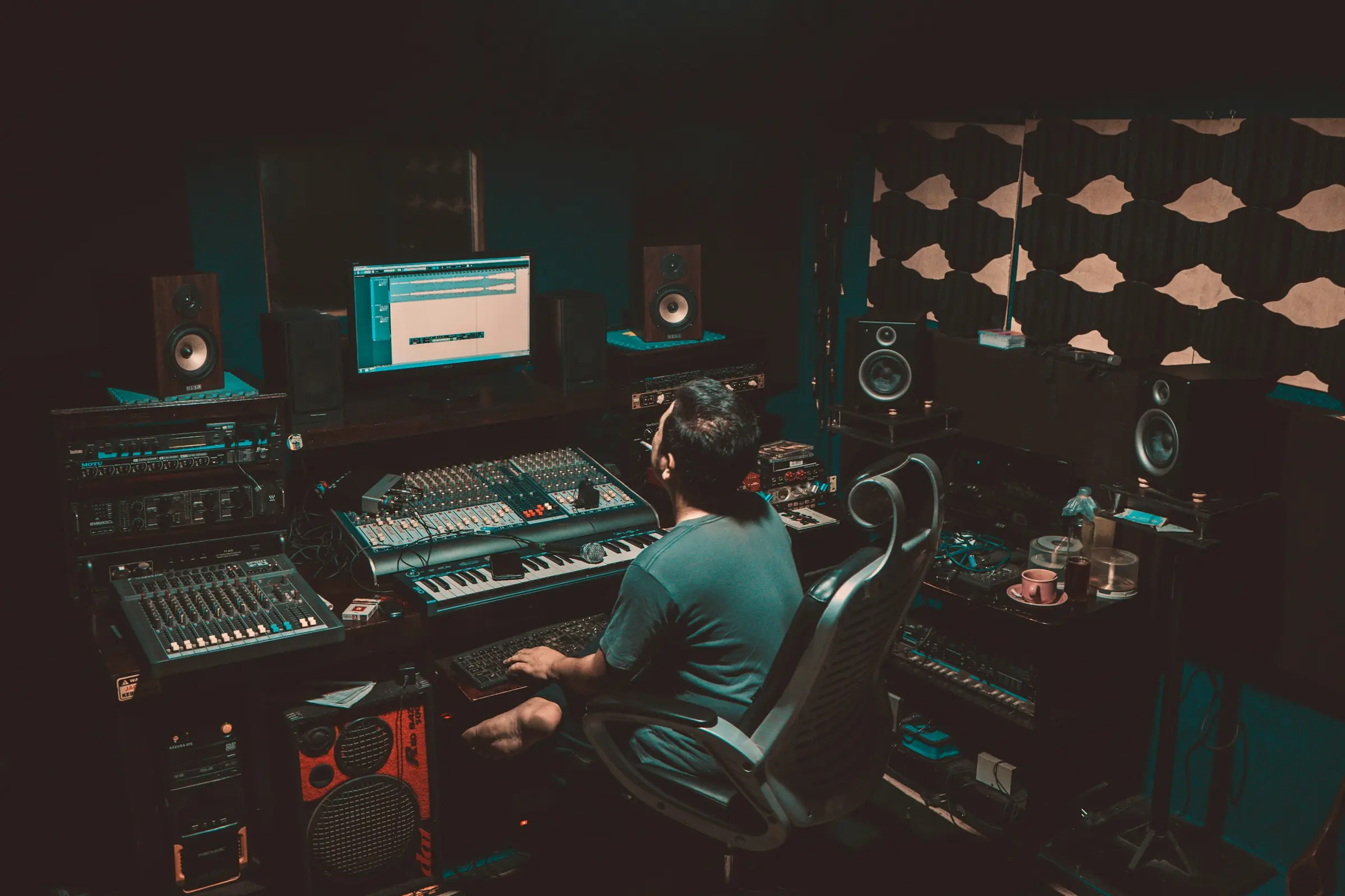 A producer at the desk in the STATIC control room