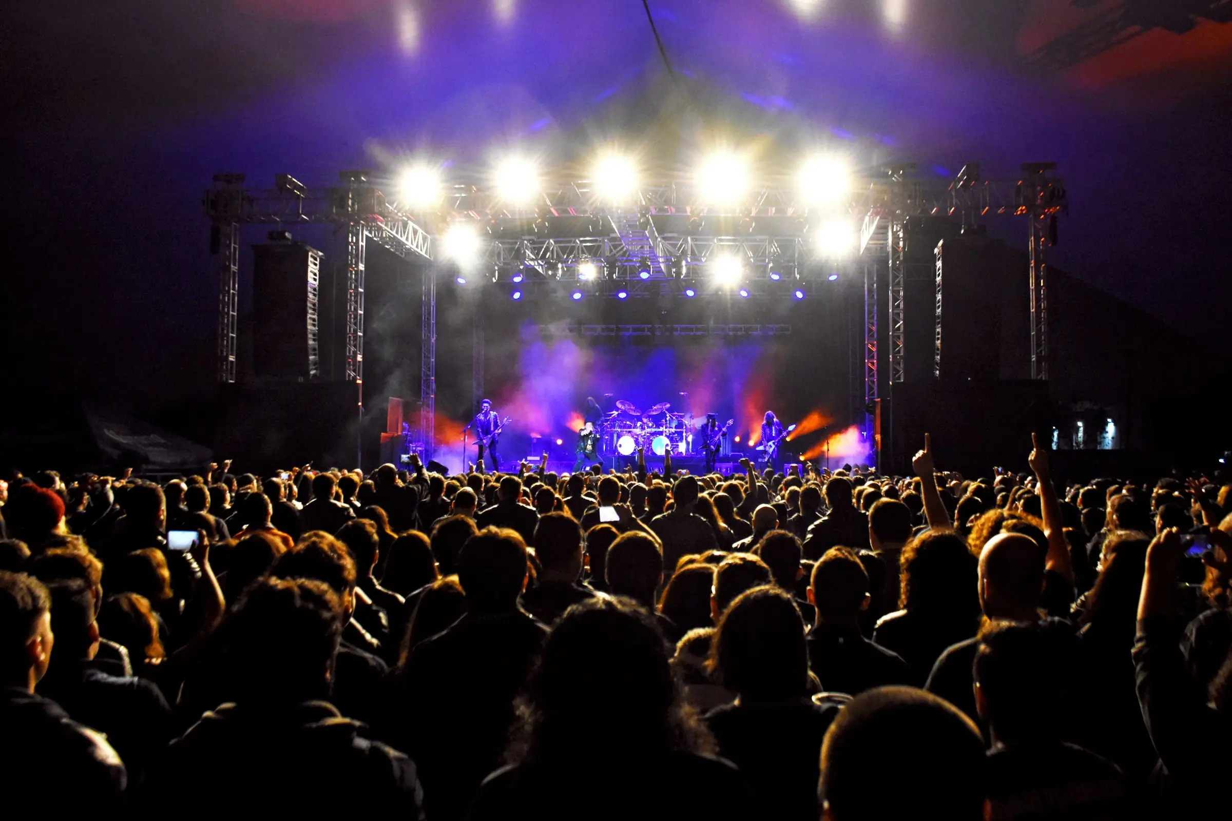 Stage lights over a crowd