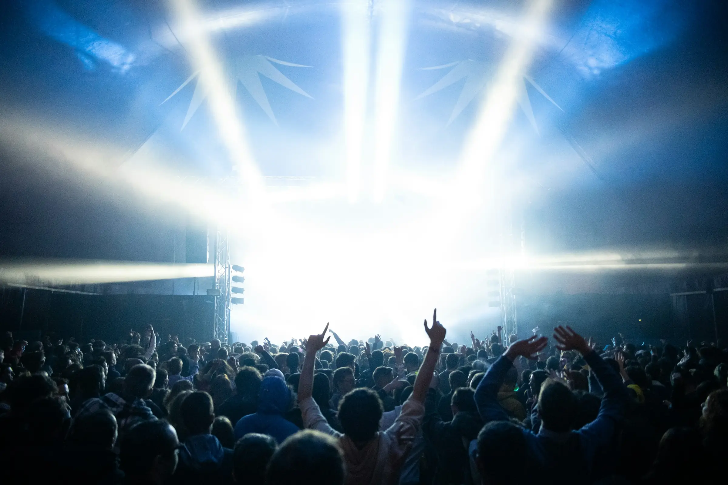Stage lights over a crowd
