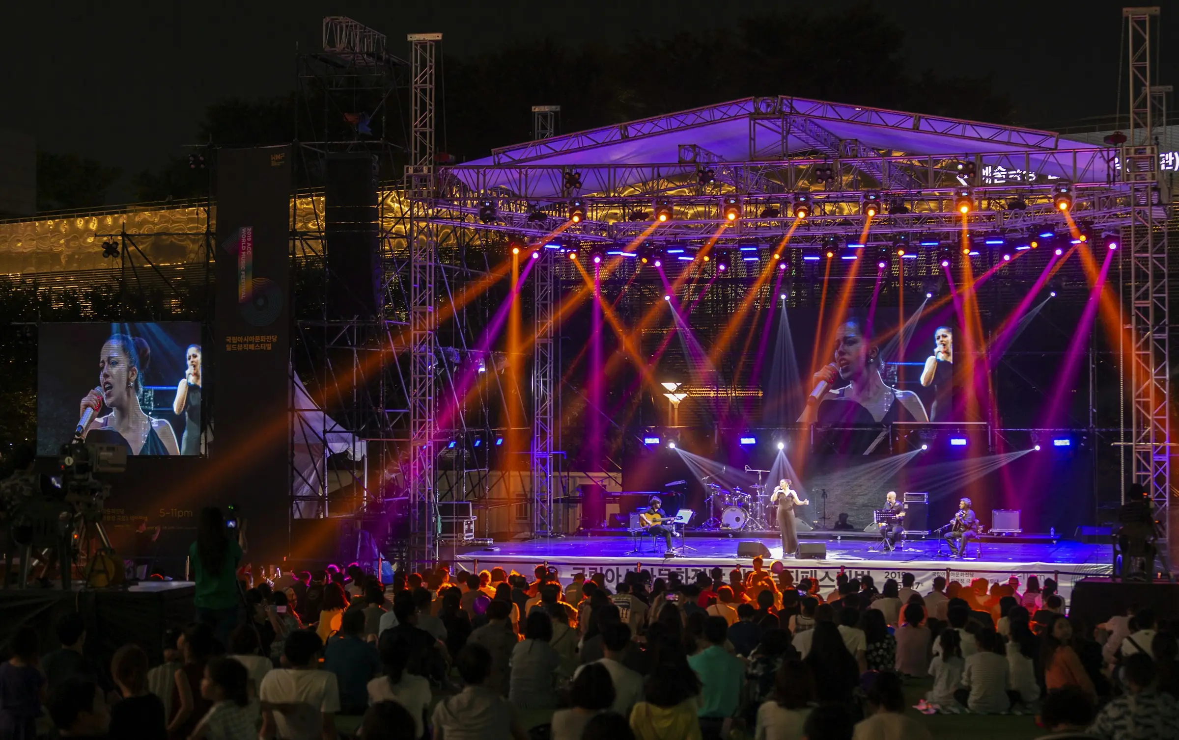 Stage lights over a crowd