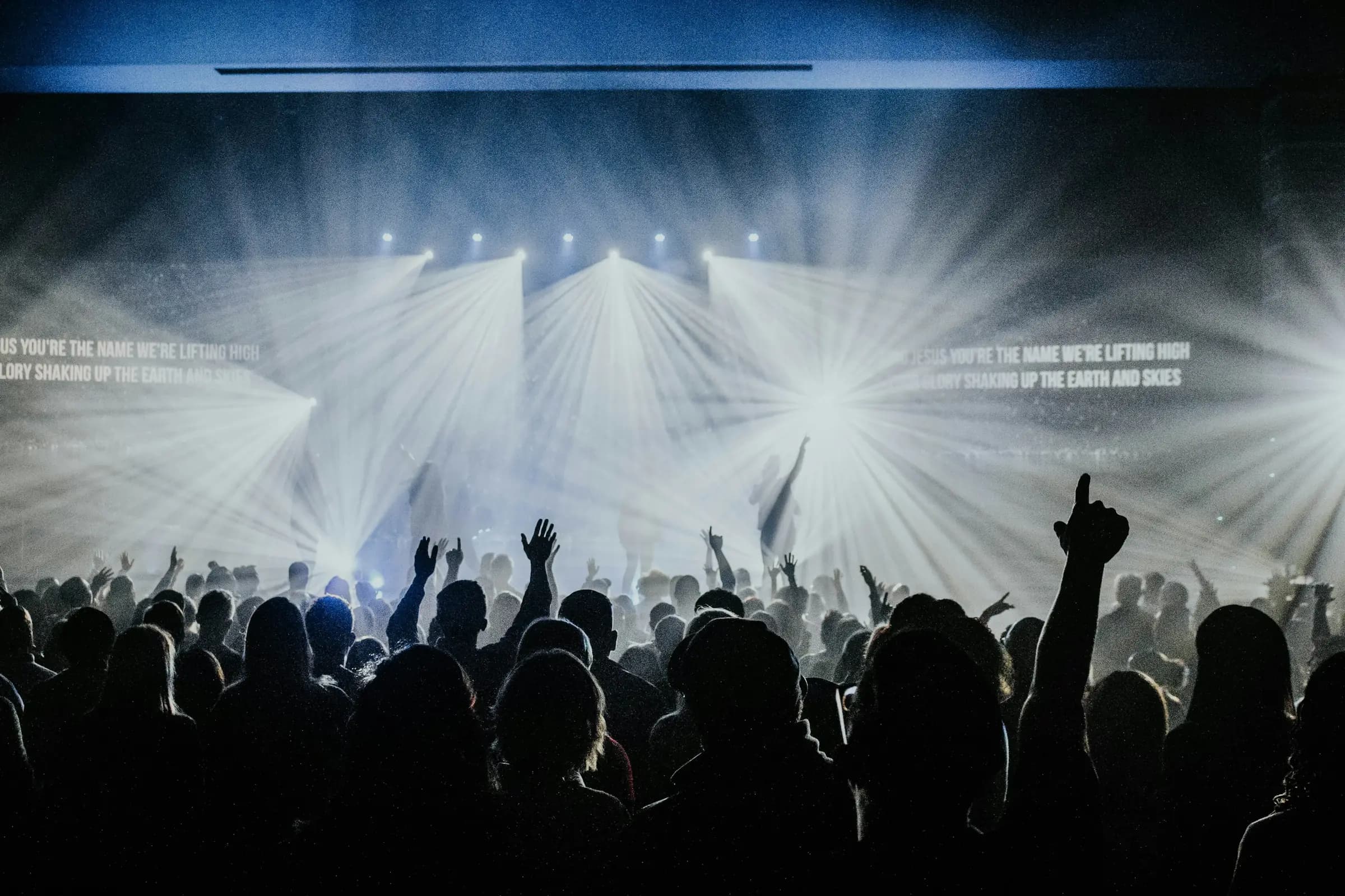 Stage lights over a crowd