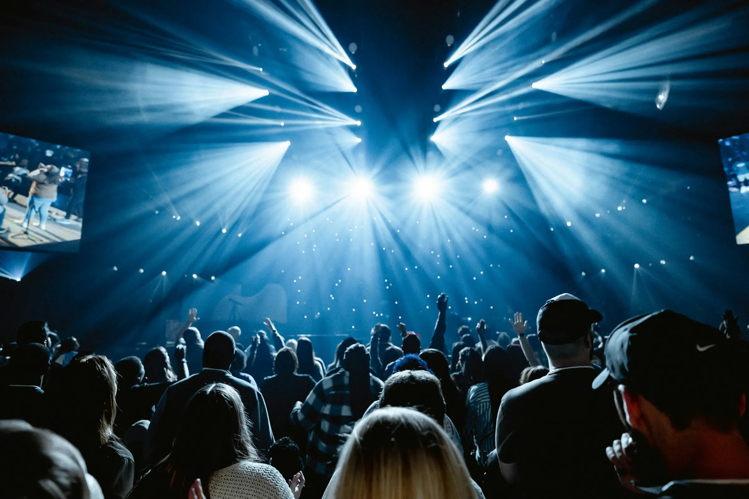 Stage lights over a crowd
